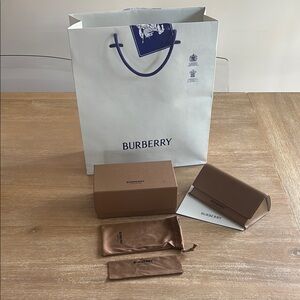 Burberry sunglasses case, pouch and cloth.